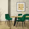 A dining room scene with a table and chairs. Náhled obrázku produktu