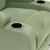 Close-up view of a green recliner chair with integrated cup holders. Voir les images du produit