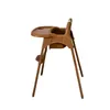 A brown high chair is shown from the side against a white background. Produktbild-Vorschau