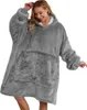 A woman is wearing a gray hooded blanket. Náhľad obrázku produktu