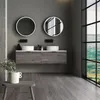 A modern bathroom with a double vanity, two round mirrors with LED lighting, and a large window overlooking a green landscape. Podgląd zdjęcia produktu