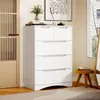 A white chest of drawers is shown in a room with a door and a mirror. Podgląd zdjęcia produktu