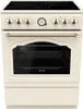 A front view of a cream-colored Gorenje stand-alone oven with a black glass door and a black stovetop. Voir les images du produit