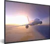 MuchoWow® Gerahmtes Poster Flugzeug über der Wolkendecke in Produktbild-Vorschau 1