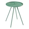 A green outdoor side table with a round top and three legs, shown against a white background. Náhled obrázku produktu