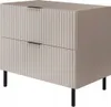 A beige washbasin cabinet with two drawers and black legs, shown against a white background. Anteprima dell’immagine prodotto