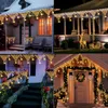 Collage of four different outdoor house decorations with Christmas lights. Náhled obrázku produktu