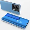 A blue smartphone with a flip case is shown, with the phone itself in the background and the case in the foreground. Produktbild-Vorschau