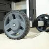 Close-up of the wheels of a rolling tool chest. Voir les images du produit