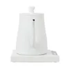 A white electric kettle with a slim spout sits on its charging base against a white background. Náhled obrázku produktu