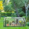 A greenhouse in a garden setting. Produktbild-Vorschau