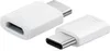 Two white USB-C adapters are shown against a white background. One adapter has a USB-C male connector, and the other has a USB-C female port. Podgląd zdjęcia produktu
