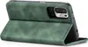 A green flip cover case for a smartphone is shown from a diagonal angle, with the cover open. Produktbild-Vorschau