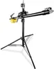 A black studio light stand with an adjustable arm and a yellow counterweight, shown against a white background. Voir les images du produit