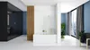 A modern bathroom with a bathtub, a wooden slatted partition, and a large window overlooking a city. Produktbild-Vorschau