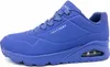 A side view of a blue Skechers sneaker against a white background. Náhled obrázku produktu