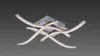 A modern ceiling light with curved LED elements. Produktbild-Vorschau