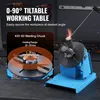 A blue welding chuck and positioner is shown in operation with sparks flying. Podgląd zdjęcia produktu