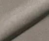 A close-up view of beige microfiber fabric, showing its texture and weave. Produktbild-Vorschau