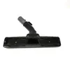 A vacuum cleaner floor head with a brush attachment, shown against a white background. Produktbild-Vorschau