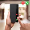 A person is holding a black smartphone case with an incoming call notification displayed on the screen. Náhľad obrázku produktu