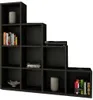 A black modular shelving unit with various items on shelves. Produktbild-Vorschau