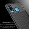 Close-up of a black carbon-look phone case, highlighting the camera protection feature. Podgląd zdjęcia produktu