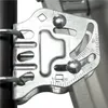 A close-up view of a metal bracket with measurement markings and screws, attached to a dark pole. Produktbild-Vorschau