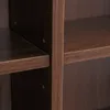 A close-up view of a wooden shelf unit, showing the texture and grain of the wood. Produktbild-Vorschau