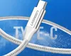 A close-up of a Ugreen USB-C charging cable with text overlays. Produktbild-Vorschau