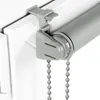 Close-up of a roller blind mechanism attached to a window frame. Produktbild-Vorschau