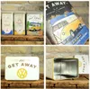 A collage of images featuring Volkswagen-themed storage tins and a book. Voir les images du produit