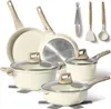A set of cookware and utensils arranged on a white background. Produktbild-Vorschau
