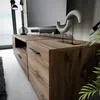 A modern living room with a TV cabinet and a TV. Náhled obrázku produktu