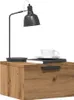 A bedside table with a lamp and a cup of coffee. Náhled obrázku produktu