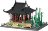 A model of a traditional Chinese pavilion made of building blocks, with bamboo plants and a sign. Náhľad obrázku produktu