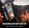 A 9V battery for a smoke detector is shown in front of flames and smoke, with a smoke detector visible at the top. Produktbild-Vorschau