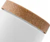 A close-up view of the rim of a white pot with a textured brown band around its top edge. Náhled obrázku produktu