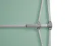A close-up view of the frame and fabric of a light green umbrella. Produktbild-Vorschau