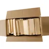A cardboard box filled with pieces of wood. Podgląd zdjęcia produktu