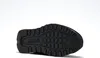 The sole of a black Reebok sneaker is shown against a white background. Voir les images du produit
