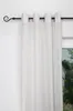 A close-up of a white curtain hanging from a black curtain rod. Produktbild-Vorschau