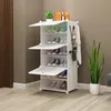 A white modular shoe rack with several shelves filled with shoes and accessories, placed in a room with a brown wall and wooden floor. Náhľad obrázku produktu