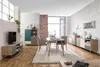 A modern living and dining room with furniture, including a TV stand, a cabinet, and a dining set. Produktbild-Vorschau