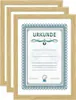 Three framed certificates are stacked on top of each other, with the frontmost certificate clearly visible. Produktbild-Vorschau