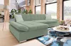 A modern living room with a sectional sofa, coffee table, rug, and plants. Náhľad obrázku produktu