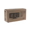 The image shows the cardboard packaging of a digital LED clock with alarm, thermometer, and hygrometer. Produktbild-Vorschau