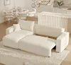 A cream-colored sectional sofa in a well-lit room with dining furniture in the background. Produktbild-Vorschau