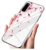 A hand holding a clear phone case with a pink floral pattern. Produktbild-Vorschau