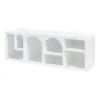 A white media console with multiple open compartments of various shapes and sizes, presented against a white background. Anteprima dell’immagine prodotto